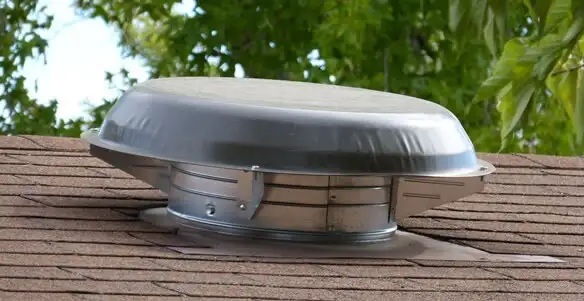 attic fan installation services with low-profile roof ventilation unit in Dallas, TX