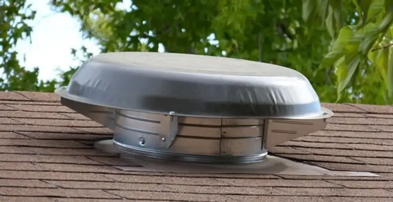 attic fan installation services with low-profile roof ventilation unit in Dallas, TX