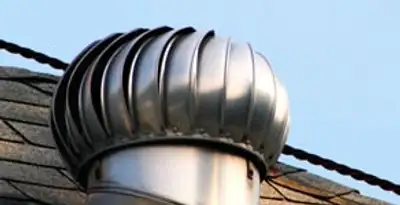 attic fan installation services with professionally installed roof ventilation unit in Dallas, TX