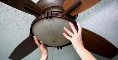 Ceiling fan repair and reinstallation on ceiling mount in Dallas, TX