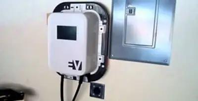 Electric car charger installation with wall-mounted EV charging station in Dallas, TX