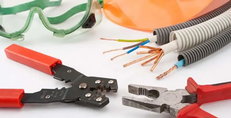 Electrical wiring repair with professional tools and safety equipment in Garland, TX