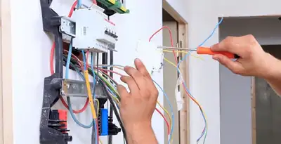 electrician services performing residential electrical panel wiring in Dallas, TX