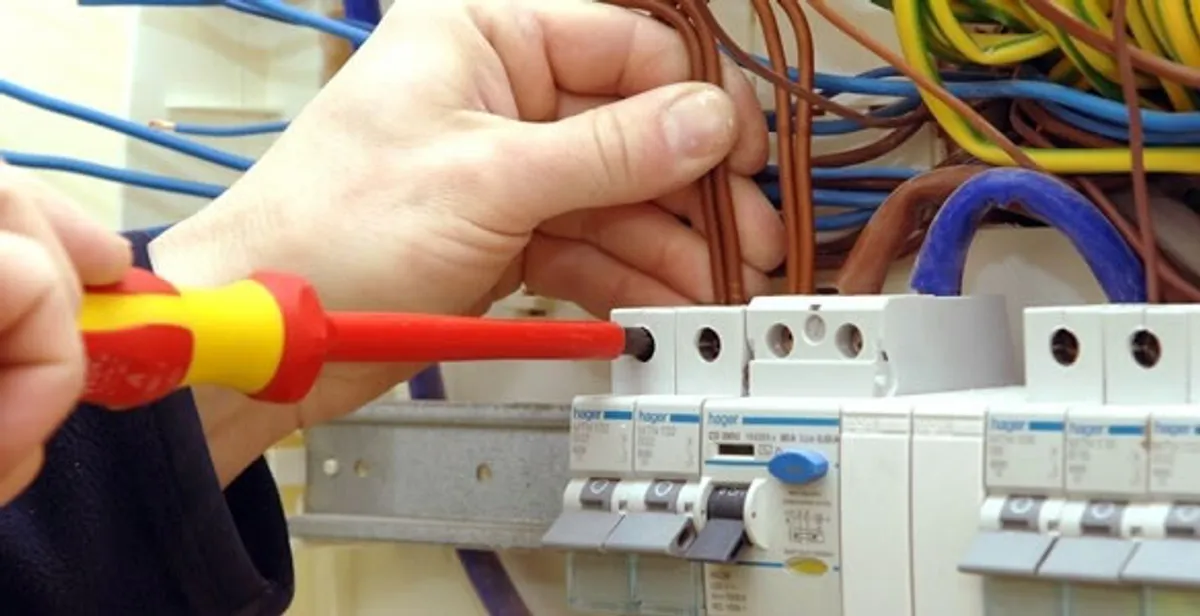 electrician services performing professional electrical panel wiring and connections in Dallas, TX