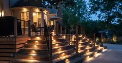 Residential electrician installing outdoor lighting for home safety in Dallas, TX