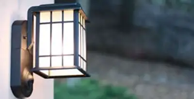 security light installation services with professionally mounted exterior wall light in Dallas, TX
